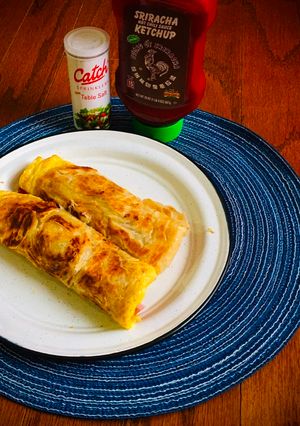 স্পাইসি এগ্ রোল (spicy egg roll recipe in Bengali) রেসিপির প্রধান ছবি