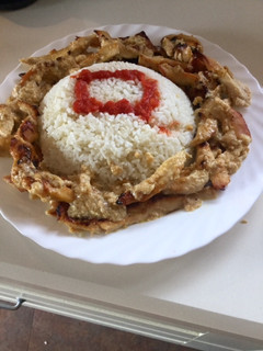 Una foto de Pollo medio chino