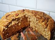 Una foto de torta de manzana con aceite