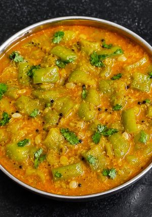 A picture of Snake gourd curry.