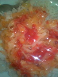A picture of Fried cabbage and rice.