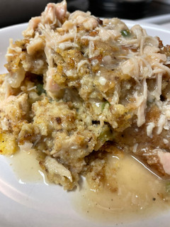 A picture of Old Fashion Chicken and Cornbread Dressing.