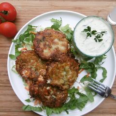 A picture of Courgette Patties with Tzaziki Dip.