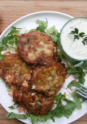 A picture of Courgette Patties with Tzaziki Dip.
