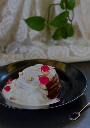 A picture of Gur ka Pooda with Vanilla Ice Cream.