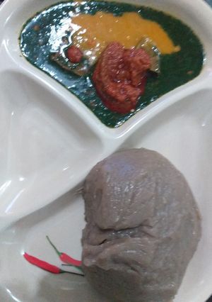 A picture of Amala, beans soup, ewedu and stew.