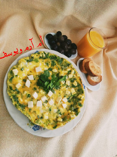 صورة لوصفة أوملات بالجبن والمعدنوس 💚