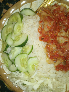 A picture of White rice en cabbage Sauce.