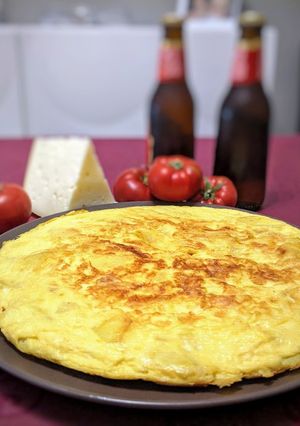 Una foto de Tortilla de patatas con cebolla