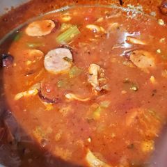 A picture of Smoked Duck, Crawfish, and Andouille Pork Sausage Cajun Gumbo (Surf, Turf, and Sky).