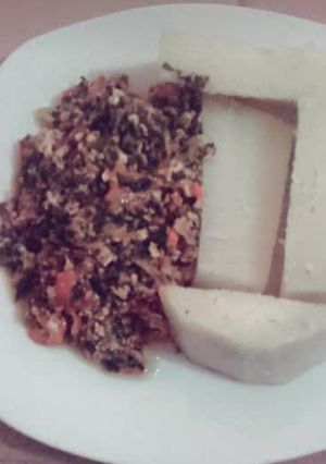 A picture of Boiled Yam and vegetable egg sauce.