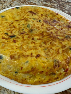 Una foto de Tortilla de patatas y calabacín