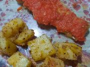 Una foto de filet de merluza al pimentón