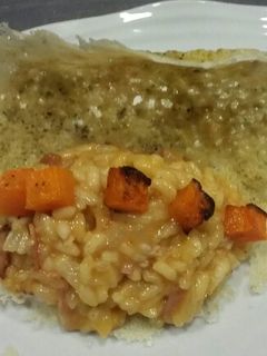 Una foto de Risotto de calabaza y panceta