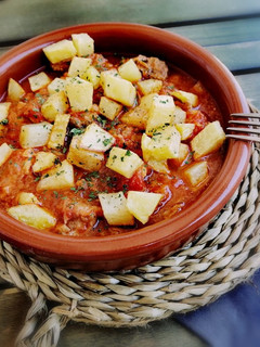 Una foto de Carne con tomate