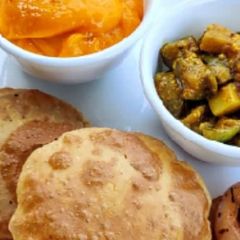 Aamras puri A picture of Aamras puri.