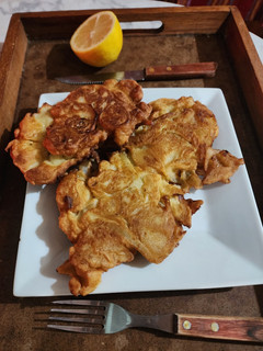Una foto de Tortilla de cebolla y papas caserita