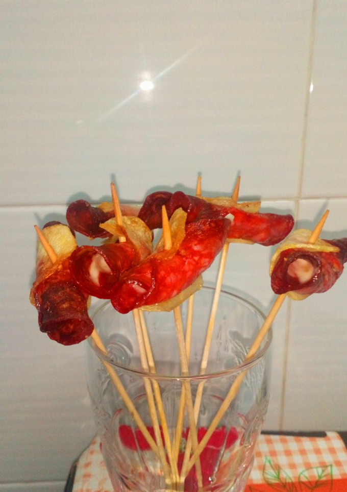 Una foto de Pincho de chorizo y patata