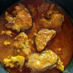 A picture of Cauliflower potato with sweet water rui fish kalia.