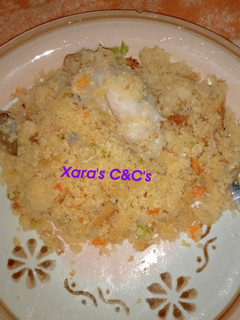 A picture of Veggies Couscous with Chicken.