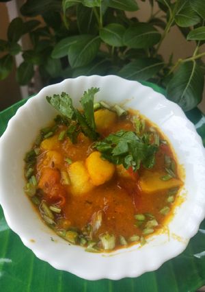 A picture of Twisted Aloo-Tamatar Curry.