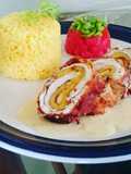 Pechugas a la cordón blue aplatanadas con arroz dorado