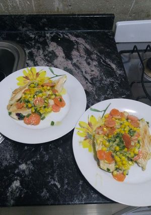 Una foto de Pollo al verdeo con zanahorias y choclo
