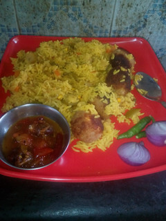 A picture of Veg rice with soya paneer ball.
