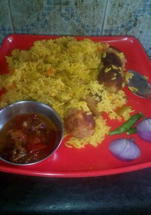 A picture of Veg  rice  with soya paneer ball.