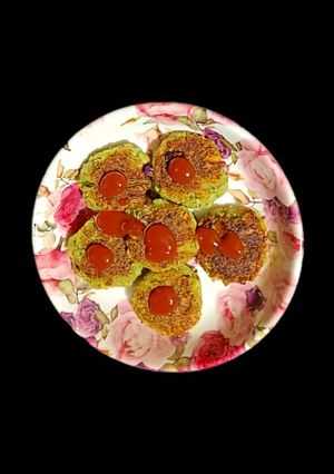 A picture of Cheese Broccoli Aloo coins.