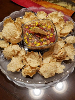 A picture of Mexican Bean Salsa with corn Tortilla chips.
