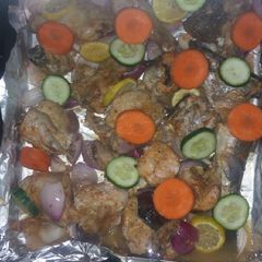 A picture of Lemon pepper chicken and fish.