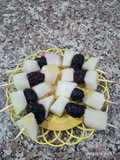 Brochettes melon / mûre violette