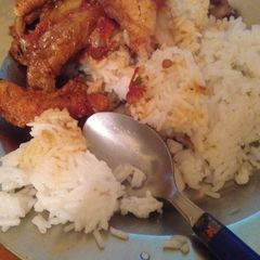 A picture of Nile perch fillet with rice.