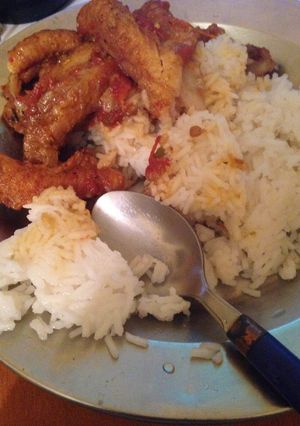 A picture of Nile perch fillet with rice.