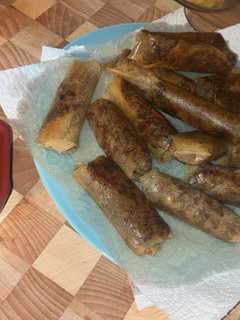 A picture of Duck Confit Spring Rolls.