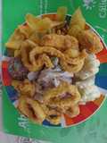 Ceviche de pescado con calamar frito