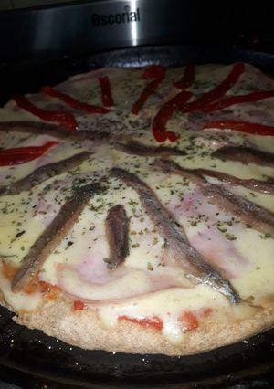 Una foto de Pizza de harina integral