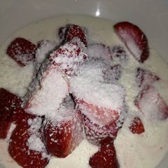 A picture of Strawberries and cream.