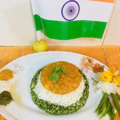 A picture of Tricolour baked Spinach Paneer Rice.