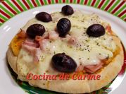 Una foto de pizzetas con jamón