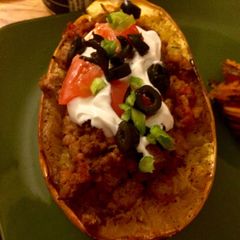 A picture of Burrito Stuffed Spaghetti Squash.