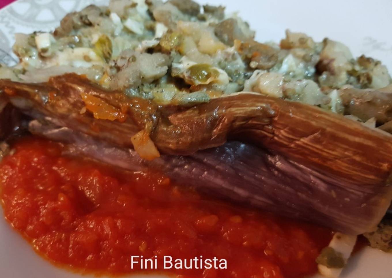 Berenjena rellena en salsa de tomate