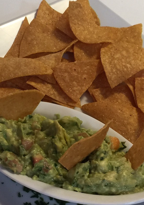 Una foto de Guaca~Nachos 😋😋