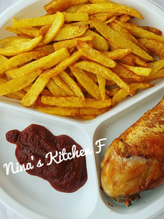 A picture of Chicken and chips.