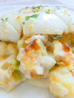 Una foto de Coliflor gratinada con bechamel y sepia