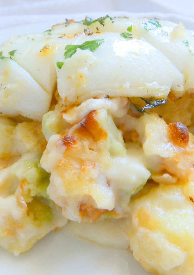 Una foto de Coliflor gratinada con bechamel y sepia