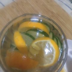 Orange lemon cucumber ginger detox drink A picture of Orange lemon cucumber ginger detox drink.