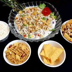 A picture of Dehi wali chana aalu chaat with lawazmat.