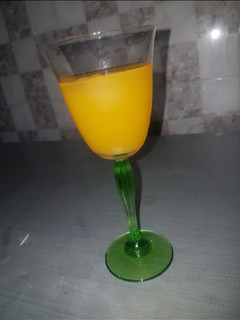 A picture of Mango and orange juice.